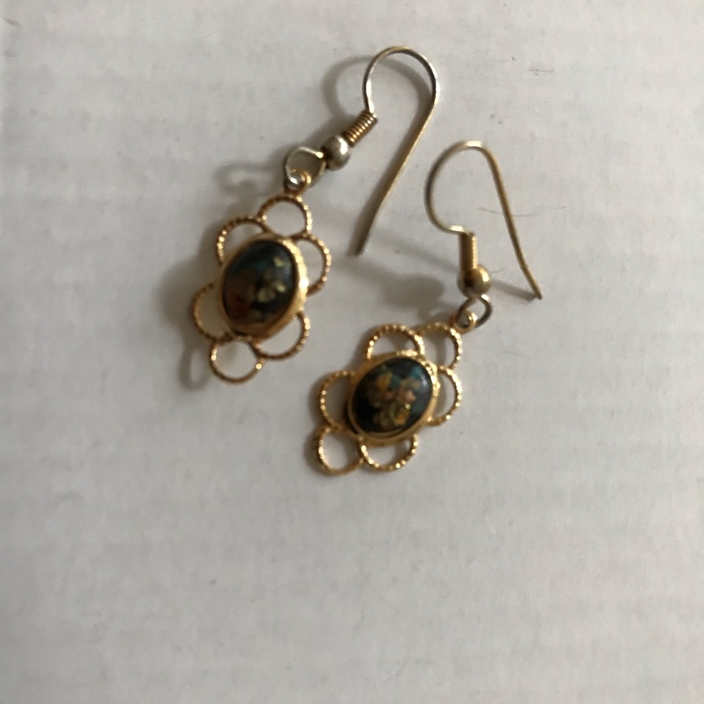Gold tone earrings with stone
